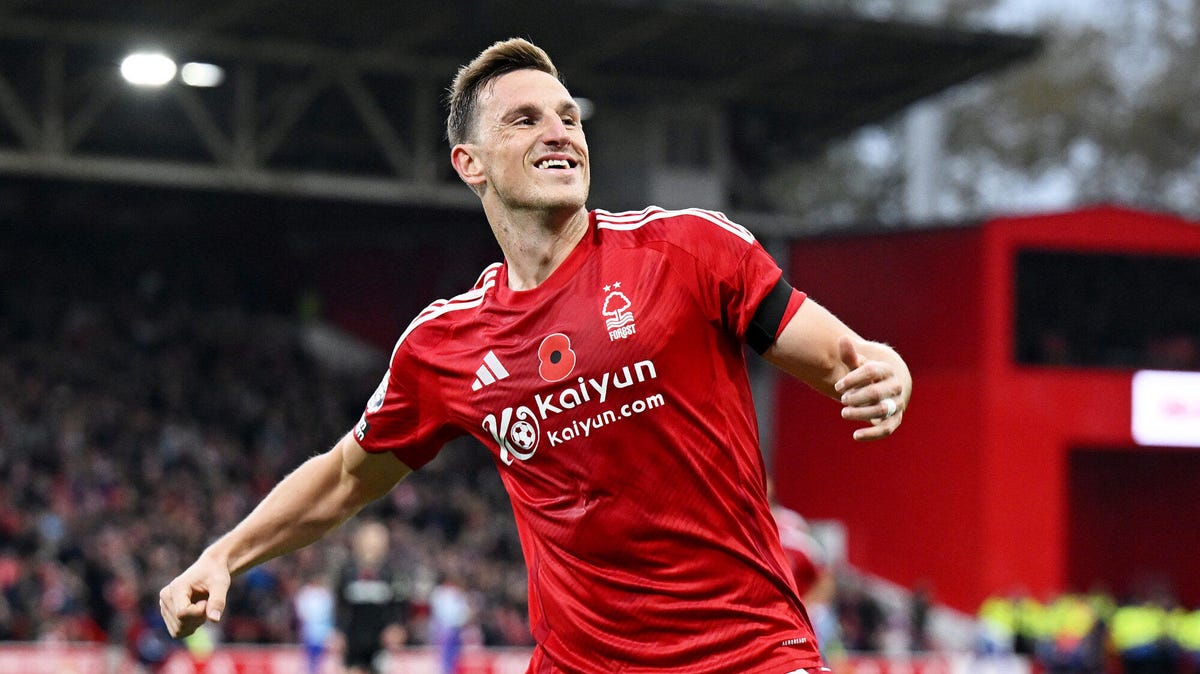 Nottingham Forest striker Chris Wood smiling, celebrating.