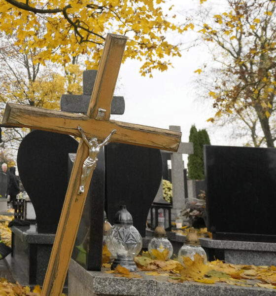 People prepare for All Saints' Day at the cemetery in Zakroczym, near Warsaw, Poland, Wednesday, Oct. 30, 2024. (AP Photo/Czarek Sokolowski)