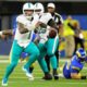 Tua and the Dolphins keep playoff hopes alive in win vs. Rams