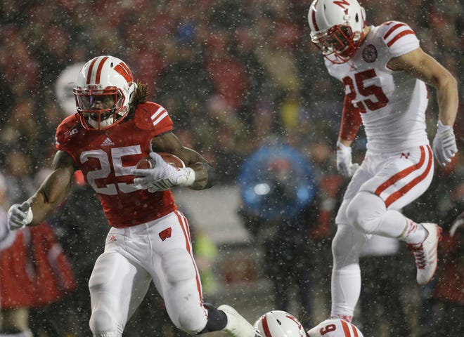 Wisconsin running back Melvin Gordon (25) runs for a touchdown during third quarter of their game on November 15, 2014, at Camp Randall Stadium in Madison, Wis. Wisconsin beat Nebraska 59-24.