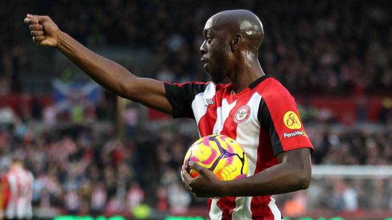 Yoane Wissa salutes the home crowd after equalising for Brentford against Leicester