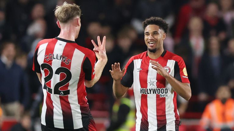 Kevin Schade celebrates after completing his hat-trick against Leicester