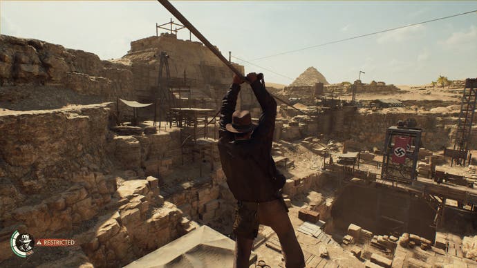 Indy ziplines into an Egyptian dig site in Indiana Jones and the Great Circle.