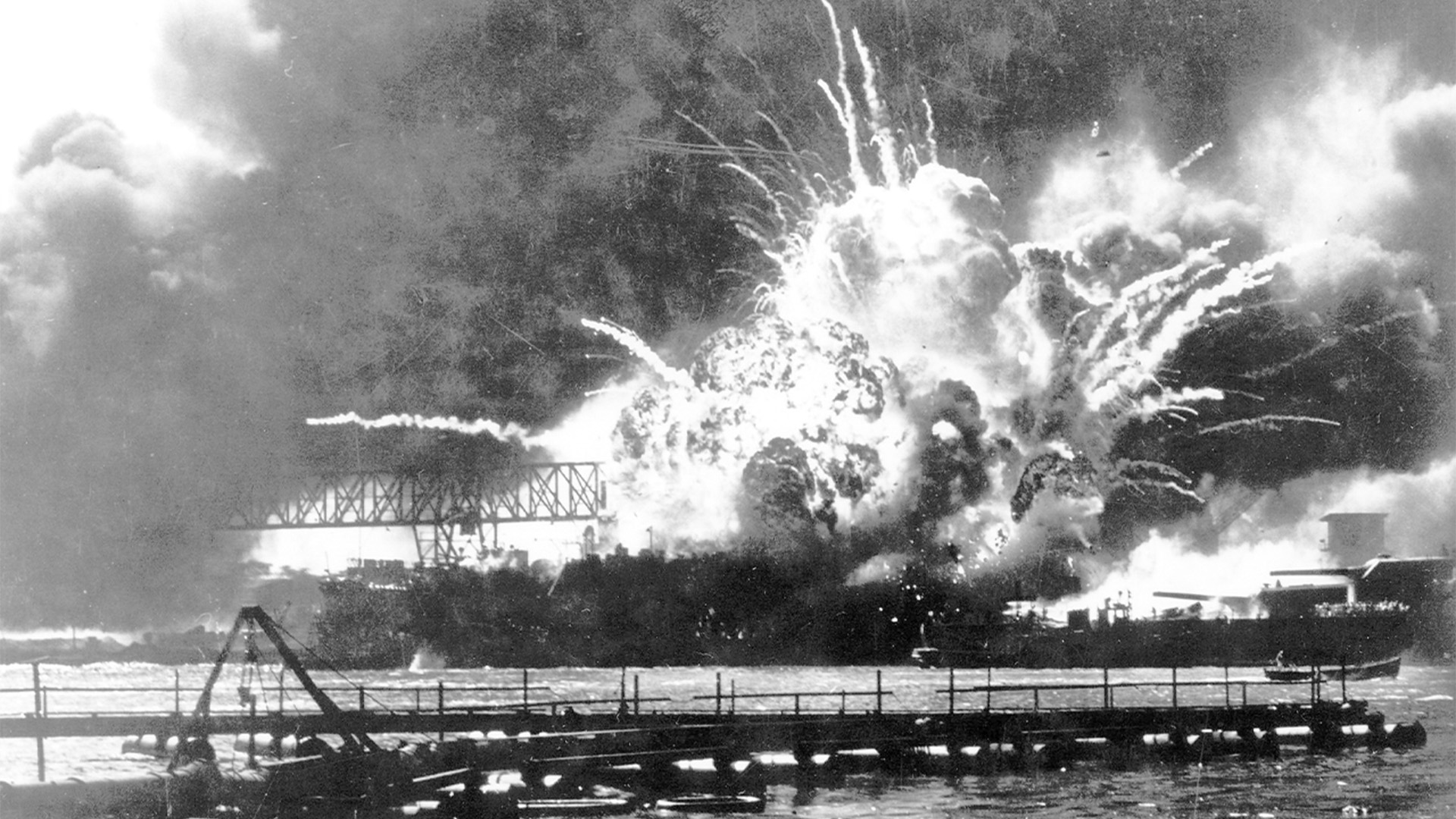 In this photo provided by the U.S. Navy, the destroyer USS Shaw explodes after being hit by bombs during the Japanese attack on Pearl Harbor, Hawaii, Dec. 7, 1941.