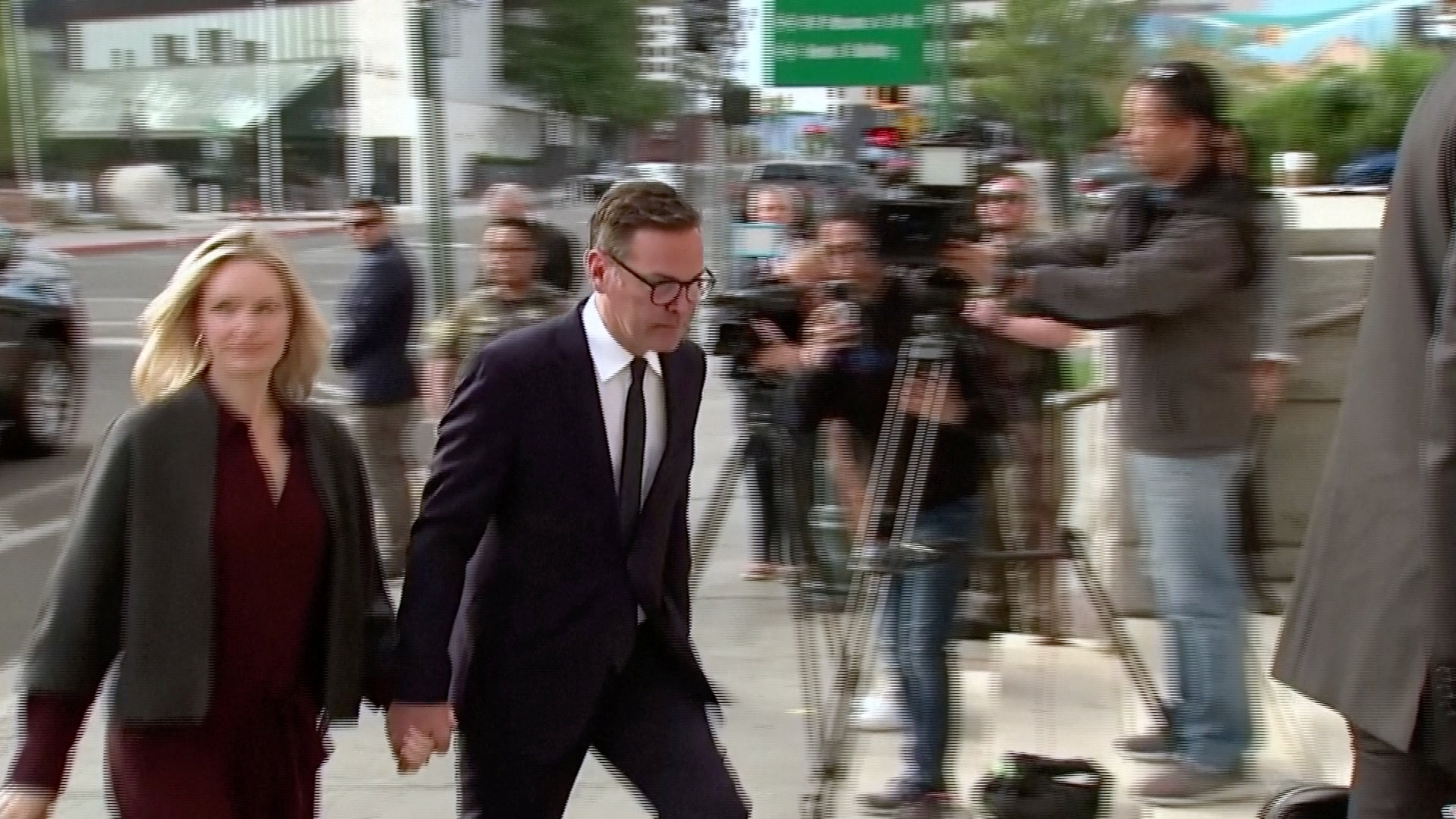 James Murdoch arrives at the court in September