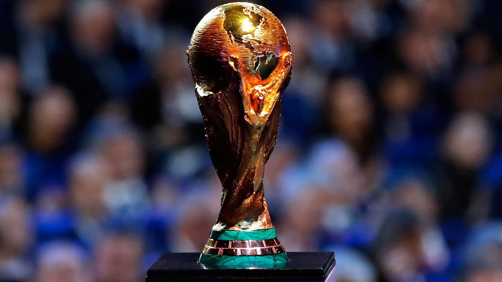 FILE - The original FIFA World Cup trophy is displayed during the 2018 soccer World Cup draw in the Kremlin in Moscow, Dec. 1, 2017. FIFA says it will consider changes to its policy that blocks league matches from being played in other countries as part of an agreement with a soccer promoter to dismiss the world governing body from a lawsuit challenging that policy. (AP Photo/Alexander Zemlianichenko, File)