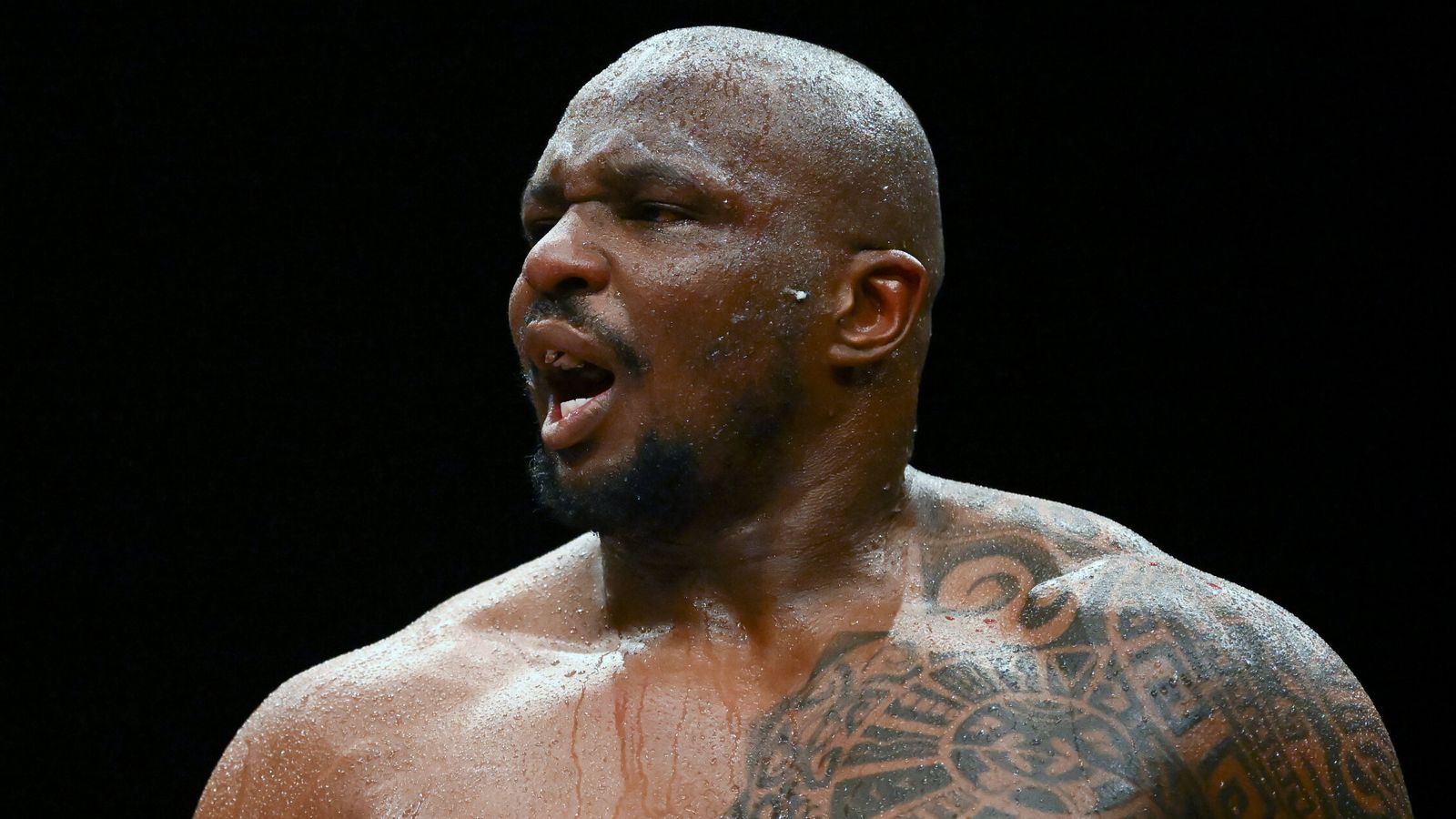 Dillian Whyte reacts after his heavyweight bout against Christian Hammer was stopped by Hammer's corner