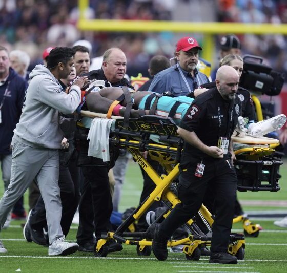 Miami Dolphins wide receiver Grant DuBose taken off the field on a stretcher after hit to the head