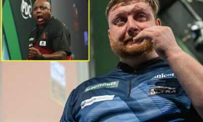 Emotional scenes as darts star Cameron Menzies sheds tears on stage during shock defeat to world No.130