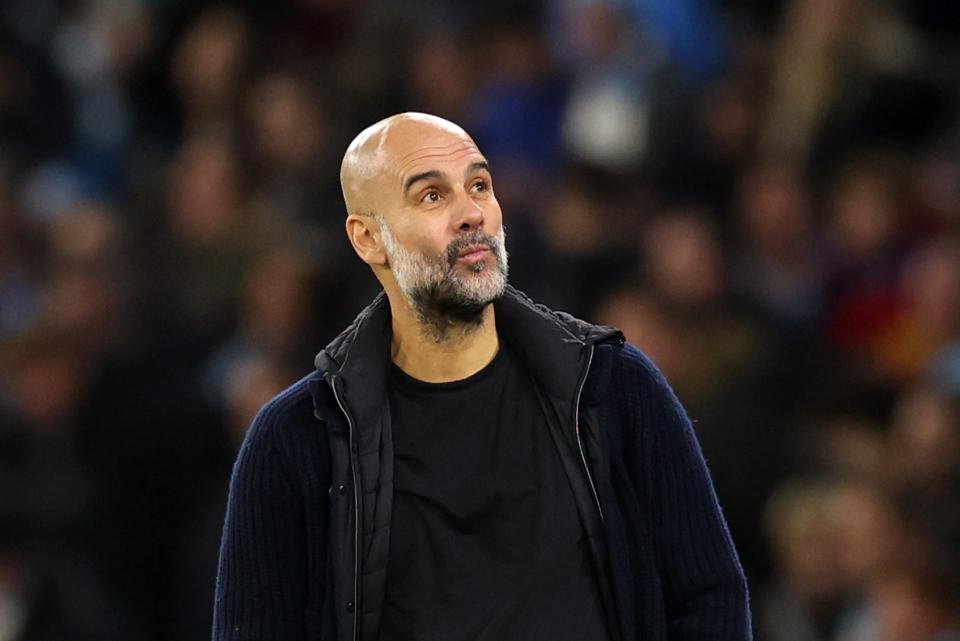 Pep Guardiola looks dejected during Manchester City’s surprise crisis (Getty Images)