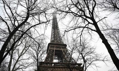 Eiffel Tower evacuated after fire alarm malfunction with Christmas visitors unable to access Paris attraction