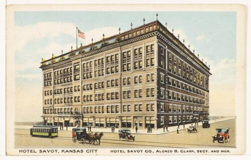 Vintage postcard showing Hotel Savoy with people arriving by street car, automobile and horse-drawn carriage.