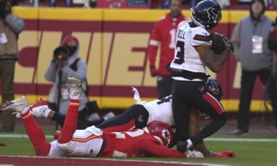 Texans WR Tank Dell hospitalized after severe knee injury on TD catch vs. Chiefs