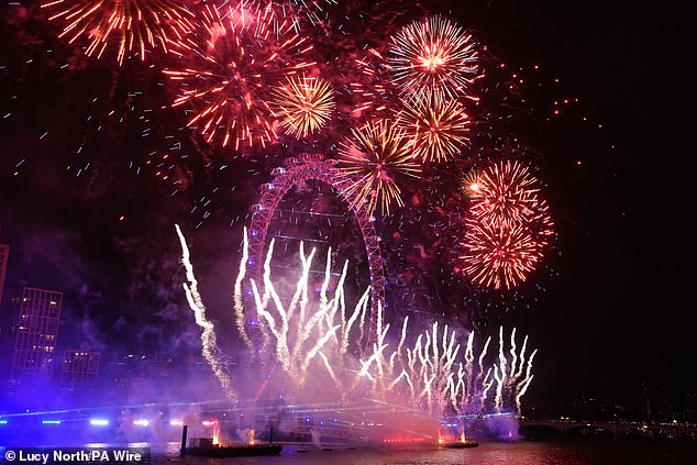 Fireworks light up the sky over the London Eye