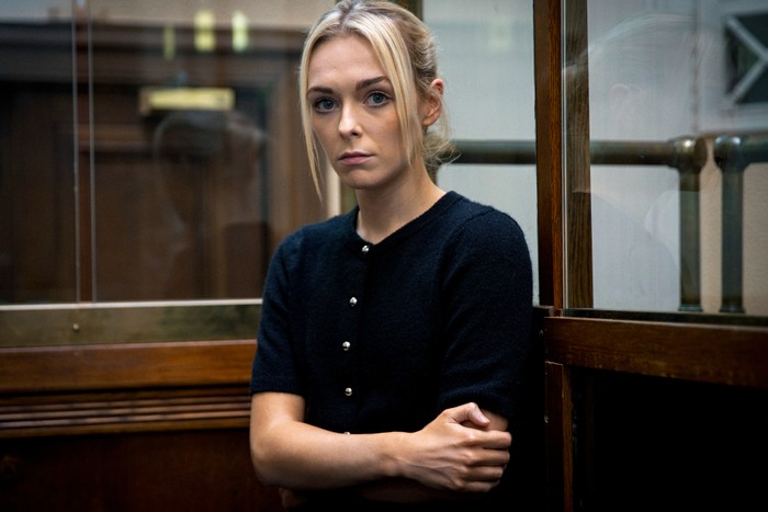 Cait Fitton as Lauren Bolton standing in court in Coronation Street