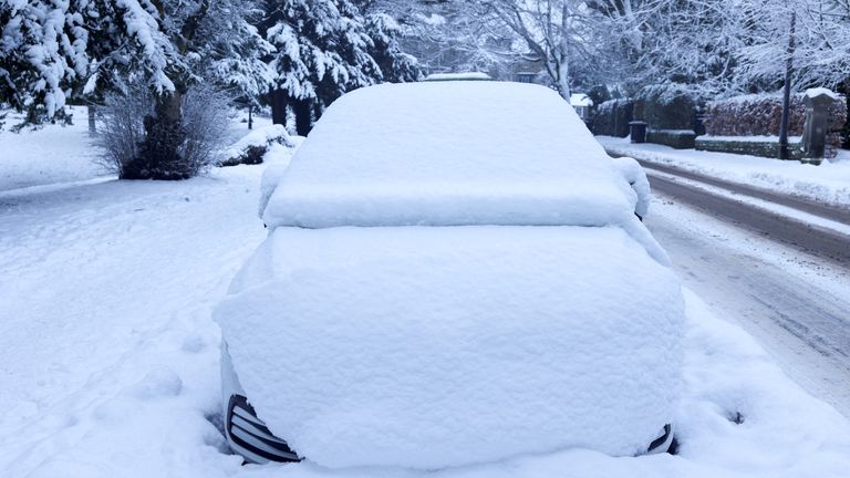 Snow covers a vehicle in Buxton.
Pic: Reuters