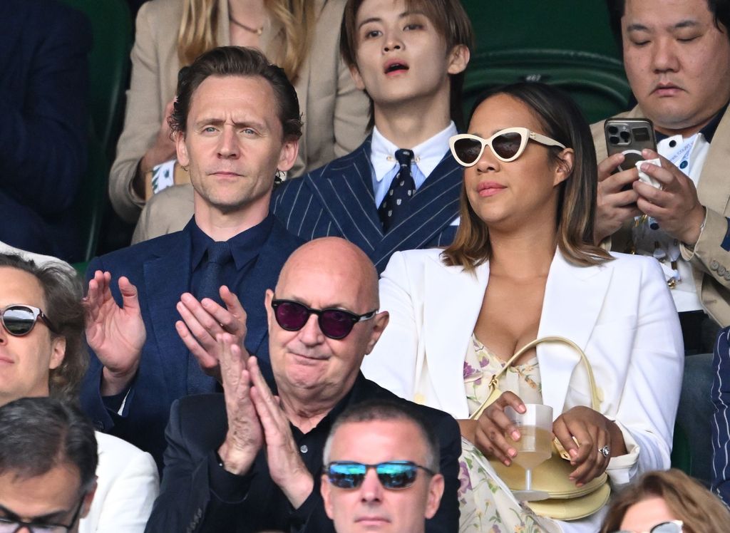 Tom Hiddleston and Zawe Ashton watching the action on Centre Court Wimbledon Tennis Championships, Day 14, The All England Lawn Tennis and Croquet Club, London