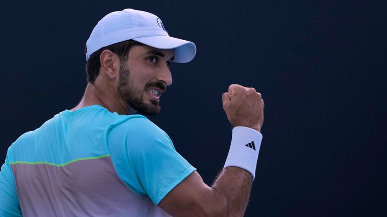 Hady Habib of Lebanon reacts after winning a point against Bu Yunchaokete of China during their first round match at the Australian Open tennis championship in Melbourne, Australia, Sunday, Jan. 12, 2025. (AP Photo/Asanka Brendon Ratnayake)