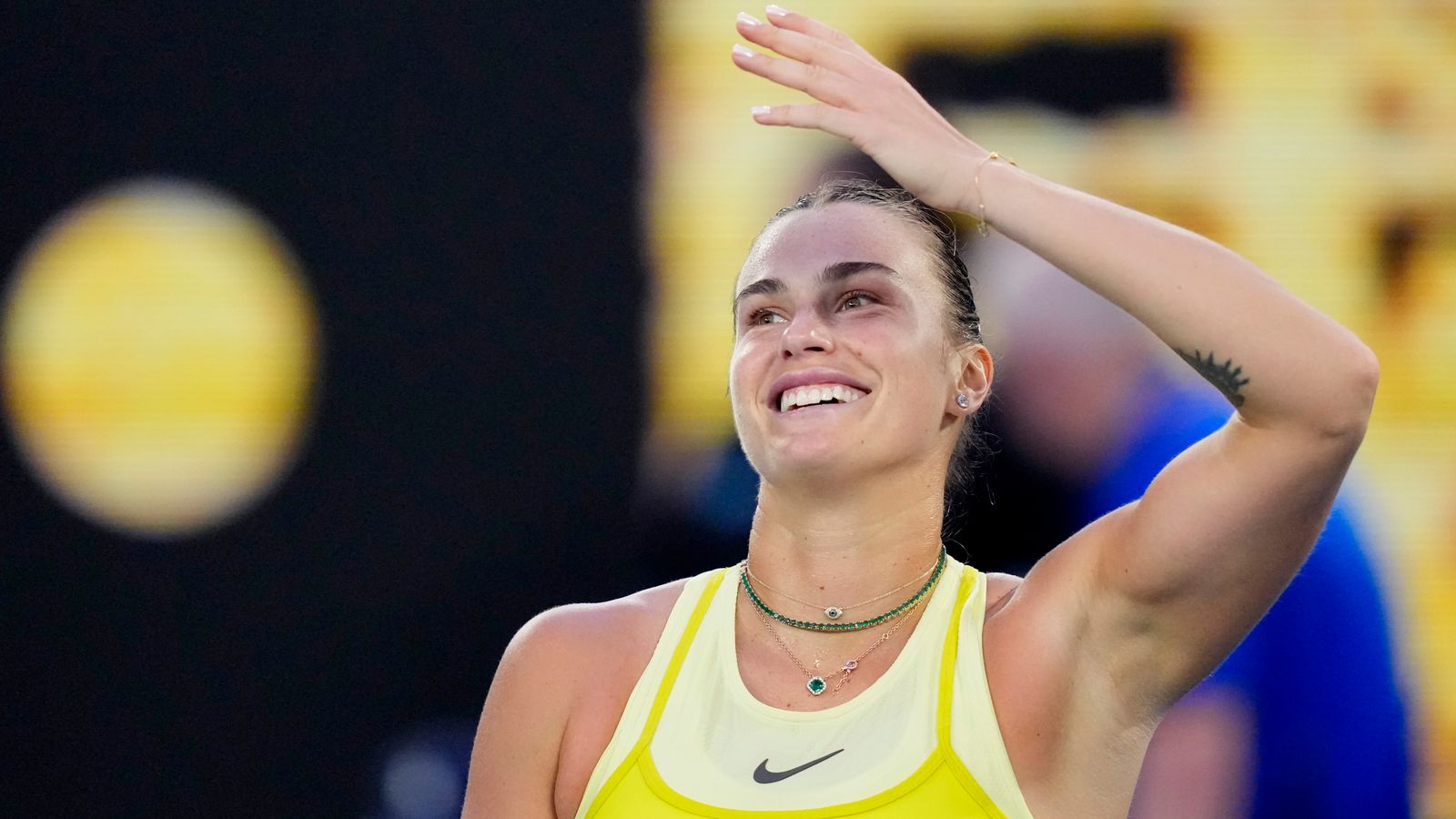 Aryna Sabalenka of Belarus reacts after defeating Sloane Stephens of the U.S. in their first round match at the Australian Open tennis championship in Melbourne, Australia, Sunday, Jan. 12, 2025. (AP Photo/Vincent Thian)