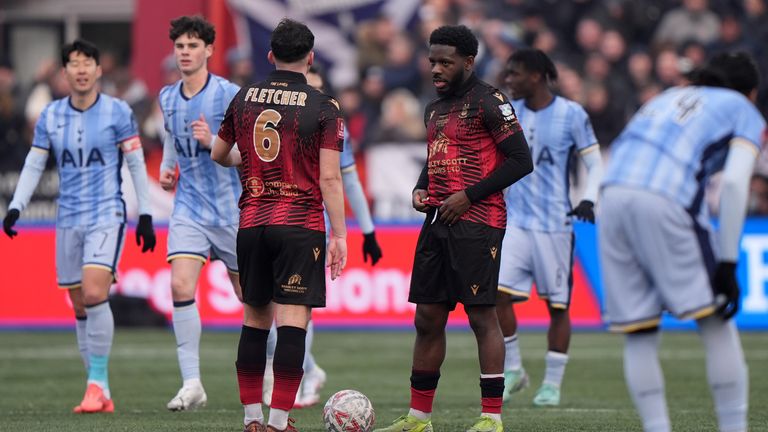 Tamworth's Nathan Tshikuna (right) is dejected 