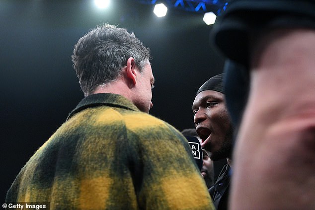 KSI and Bridge (left) squared up against each other in the ring as the fight was officially confirmed