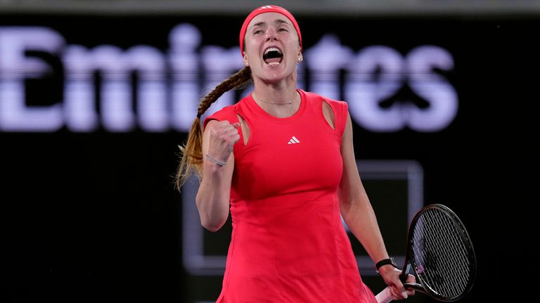 Elina Svitolina of Ukraine celebrates after defeating Jasmine Paolini of Italy in their third round match at the Australian Open tennis championship in Melbourne, Australia, Saturday, Jan. 18, 2025. (AP Photo/Vincent Thian)