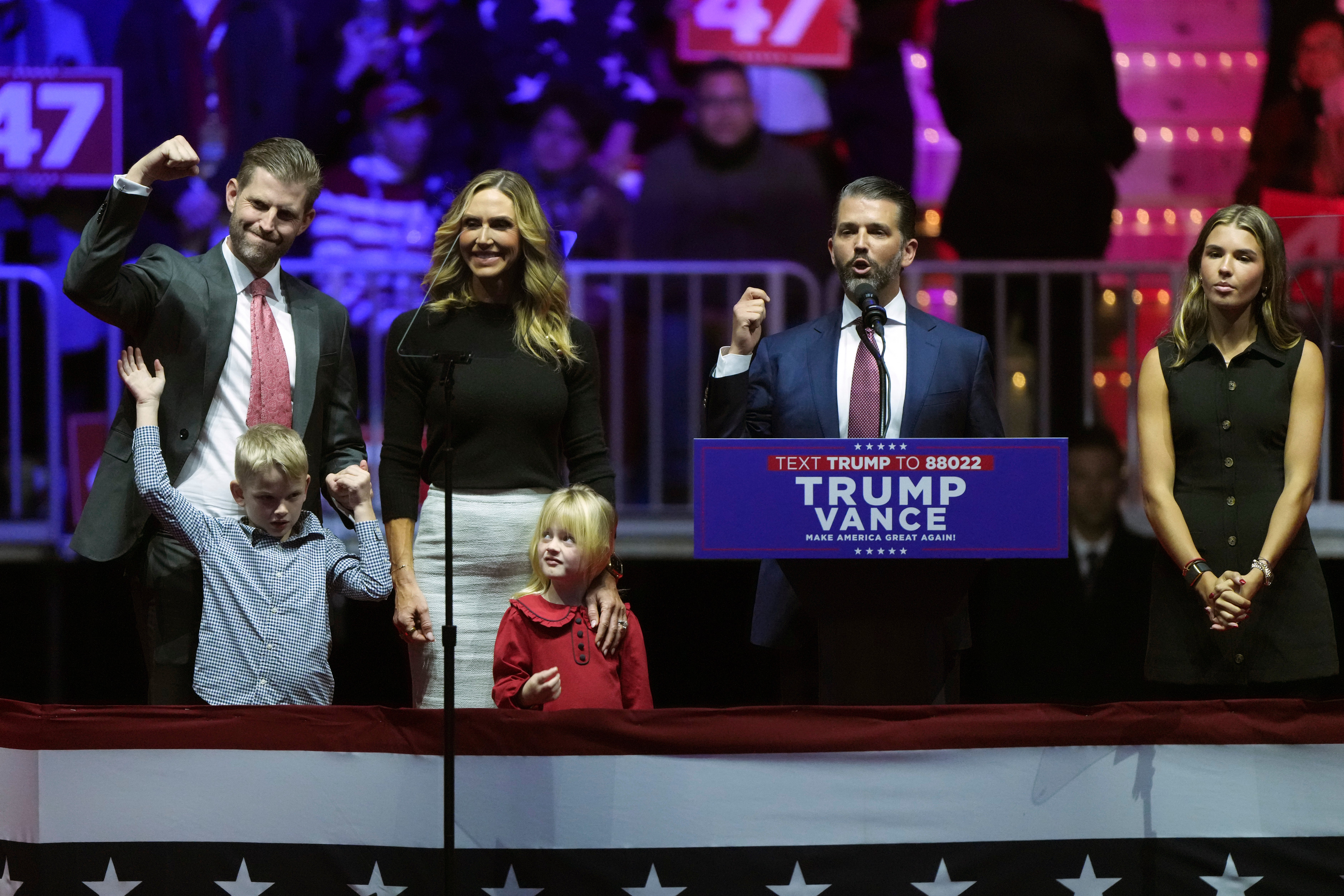 Kai, right, with family members Eric Trump, his son Luke, wife Lara Trump, their daughter Carolina and Donald Trump Jr.