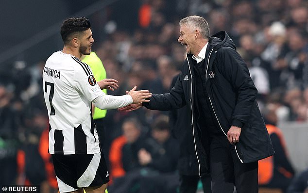 Solskjaer celebrates with Milot Rashica (left) after the Besiktas star scored twice in the win