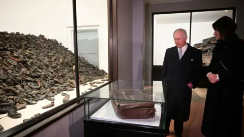 Reuters King Charles is shown around Auschwitz in Poland, following commemorations to mark 80 years since the liberation of the concentration camp