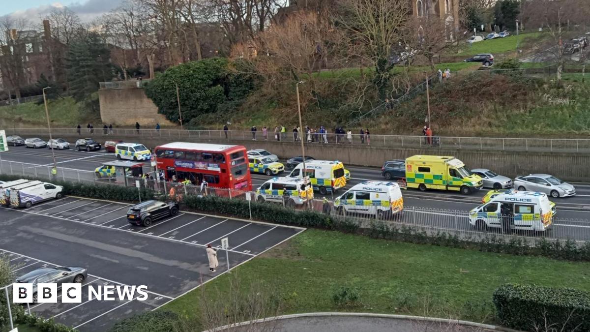 Woolwich stabbing: Police hunt killer of boy killed on London bus