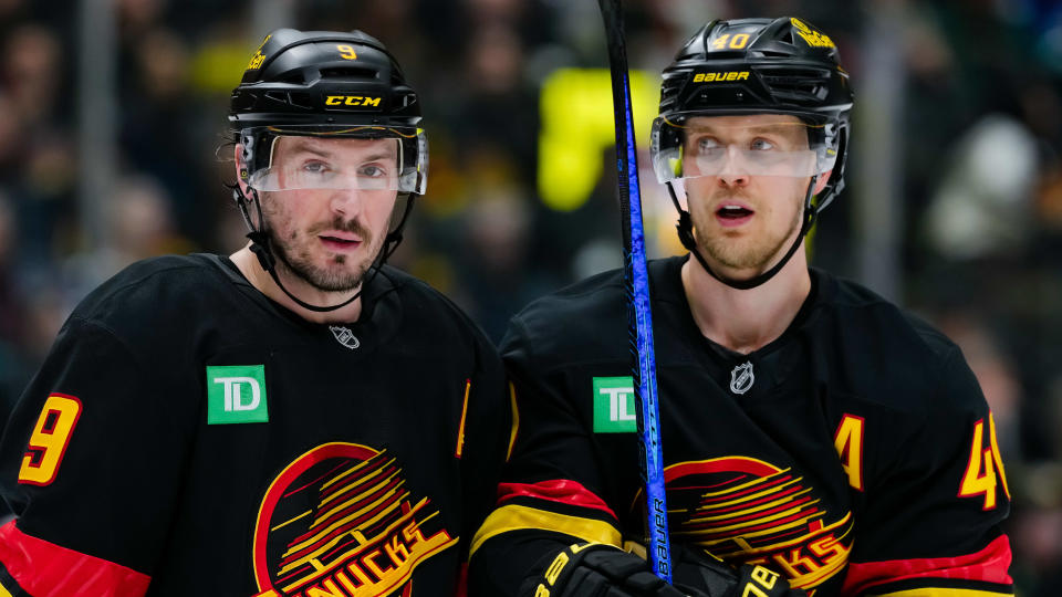 VANCOUVER, CANADA - JANUARY 25: Elias Pettersson #40 and J.T. Miller #9 of the Vancouver Canucks wait for a face off during the first period of their NHL game against the Washington Capitals at Rogers Arena on January 25, 2025 in Vancouver, British Columbia, Canada. (Photo by Derek Cain/Getty Images)